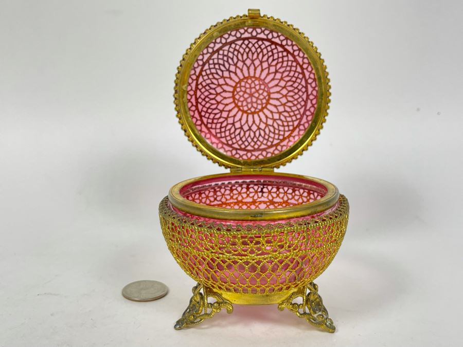 JUST ADDED - Gold Tone Metal Overlay On Ruby Glass Footed Jar With Hinged Lid 3.5W X 3.25H [Photo 1]