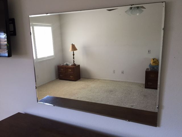 Cool Beveled Mirror with Retro Metal Accents [Photo 1]