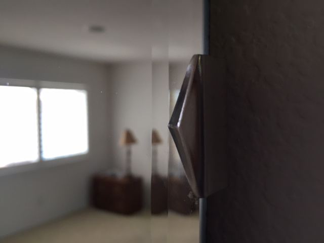 Cool Beveled Mirror with Retro Metal Accents [Photo 3]