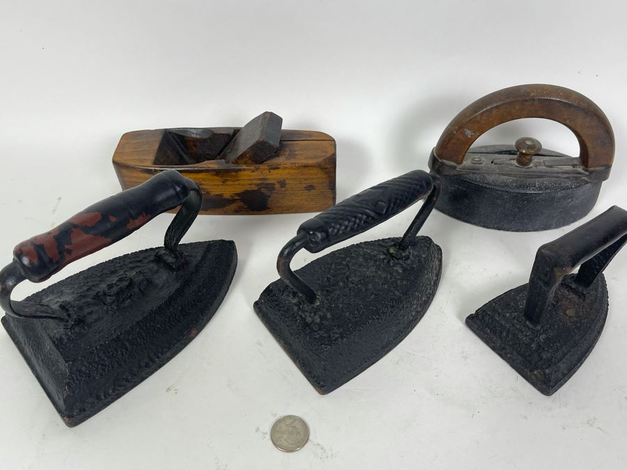 Four Vintage Metal Irons And Old Wooden Plane