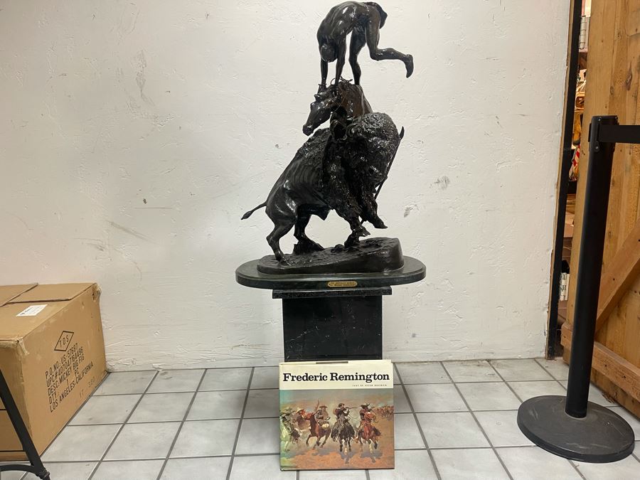 Large Frederic Remington Bronze Sculpture 25W X 12D X 31H On Marble Base 14W X 22H 'The Buffalo Horse' With Frederic Remington Book - Comes With Black Marble Pedestal Shown [Photo 1]