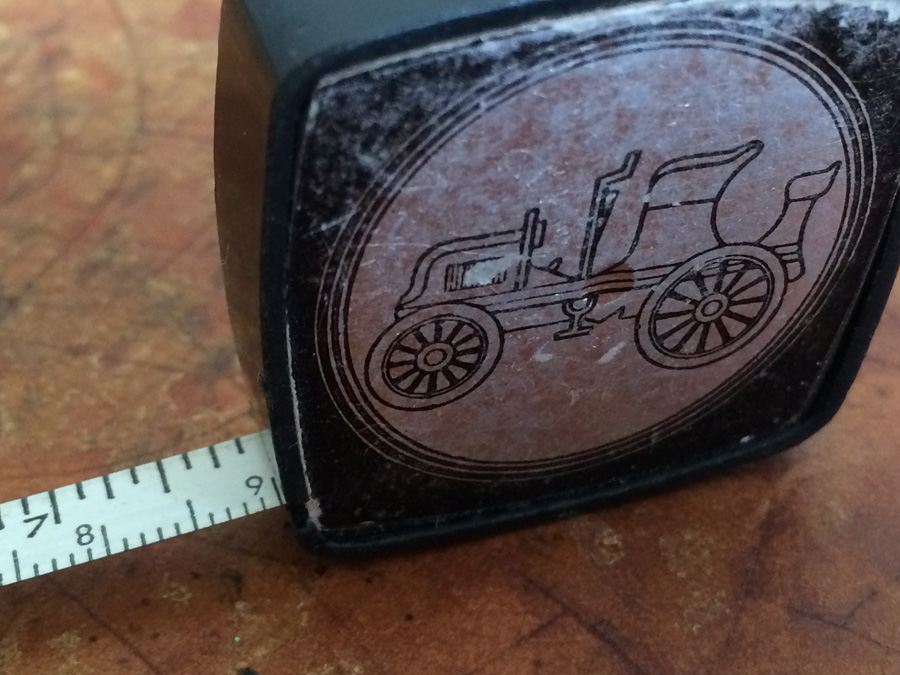Vintage Tape Measure Car Pictured on Front of Measure