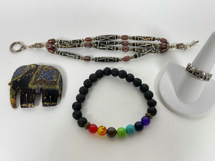 Jewelry Lot Featuring Sterling Silver Bracelet, Carved Elephant Pin, Elephant Ring And Beaded Bracelet [Photo 1]