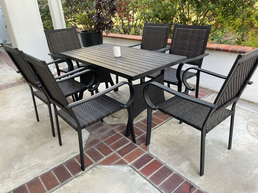 Outdoor Table With Six Chairs (Includes New Cushions) 56W X 29.5D X 28.5H [Photo 1]