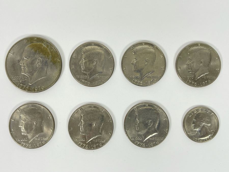 (6) 1976 Kennedy Half Dollar Coins, (1) 1976 Eisenhower One Dollar Coin, (1) 1976 Quarter