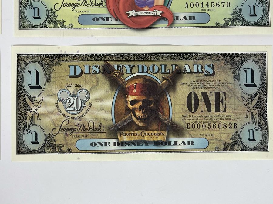 (1) Five Disney Dollars - Donald Duck, (1) One Disney Dollar - Ariel, The Little Mermaid, (1) One Disney Dollar - Pluto, (1) One Disney Dollar - Pirates Of The Caribbean [Photo 5]