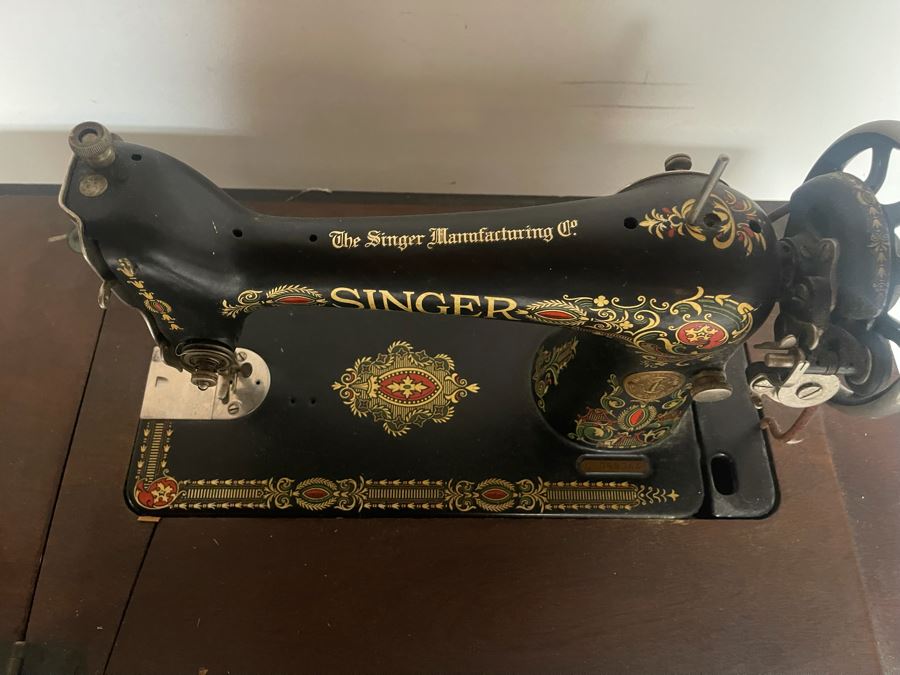 Antique Singer Sewing Machine No. 66 With Wooden Cabinet And Original Singer Instruction Book Dated 1920 In Italian And Some Sewing Supplies In Cabinet Drawers 32W X 17D X 40H [Photo 10]