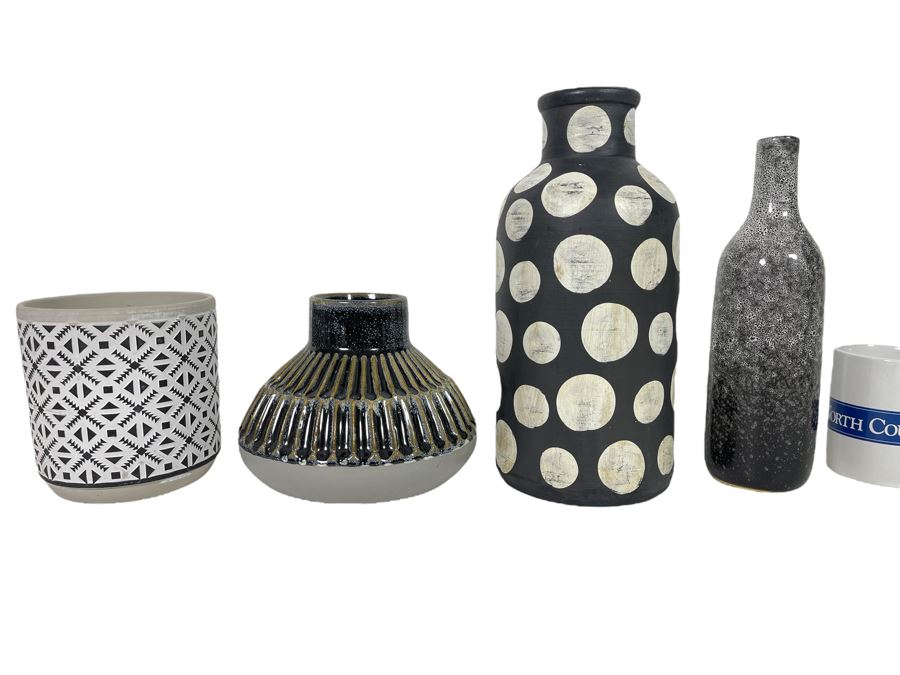 Set Of Four Black And White Vases Of Various Sizes