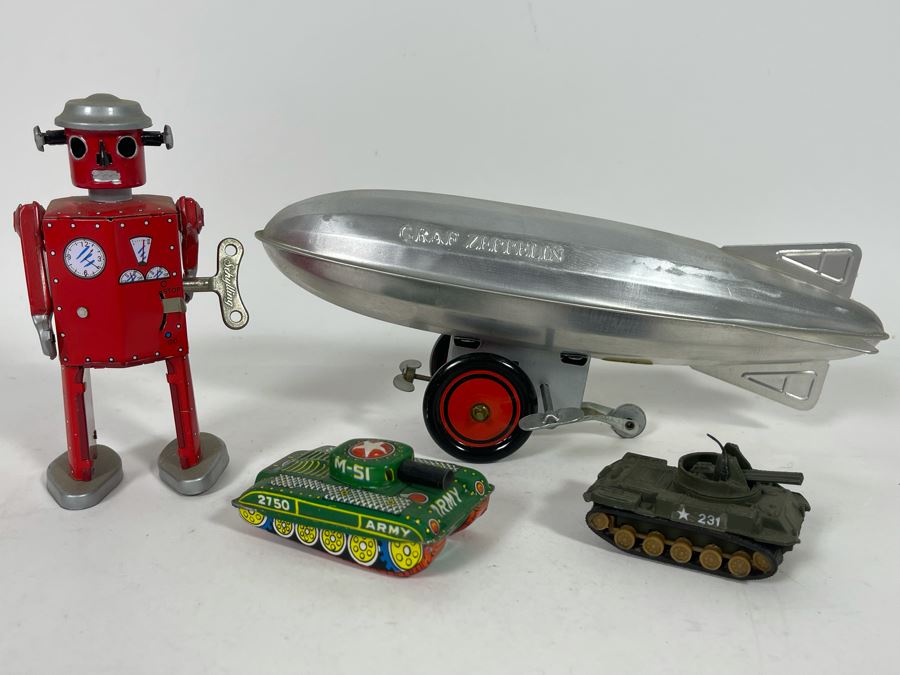 Various Toys Including Wind-Up Schylling Robot, Tanks And Graf Zepplin [Photo 3]