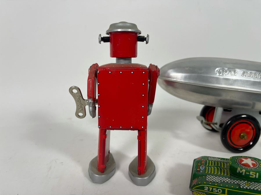 Various Toys Including Wind-Up Schylling Robot, Tanks And Graf Zepplin [Photo 6]