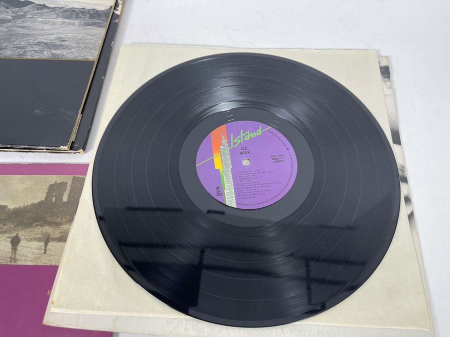 (4) U2 Vinyl Records [Photo 19]