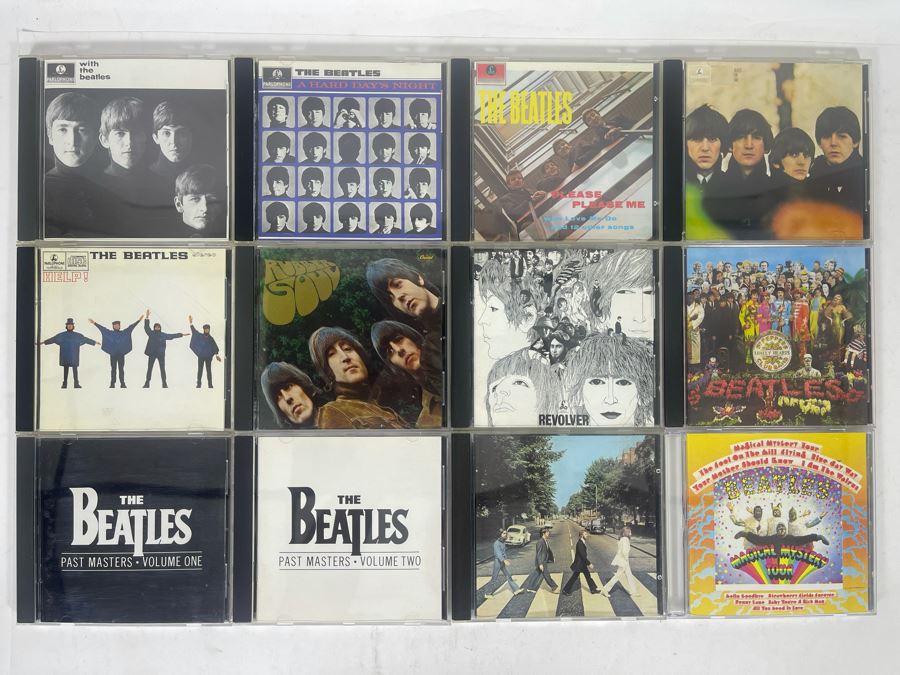 Collection Of 12 The Beatles CDs [Photo 1]