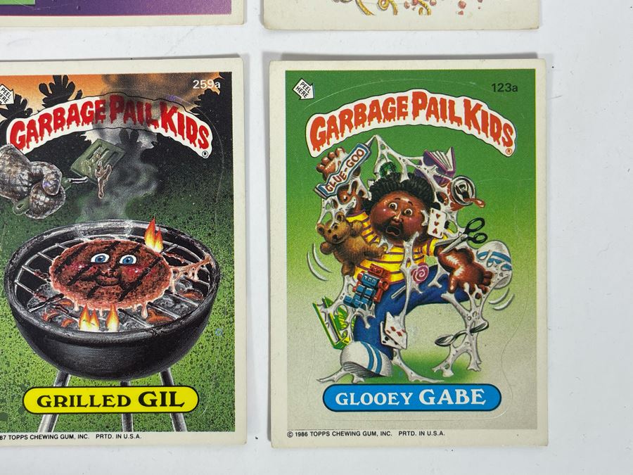 JUST ADDED - Set Of Twelve Original Eighties Pop Culture Garbage Pail Kids Stickers Cards [Photo 10]