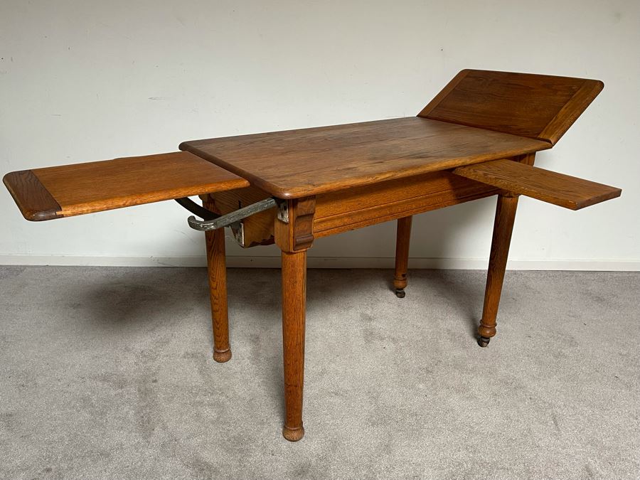 Antique Oak Doctors Medical Examiners Table Adjustable With Pair Of Metal Stirrups And Casters 41W X 24D X 29.5H [Photo 3]