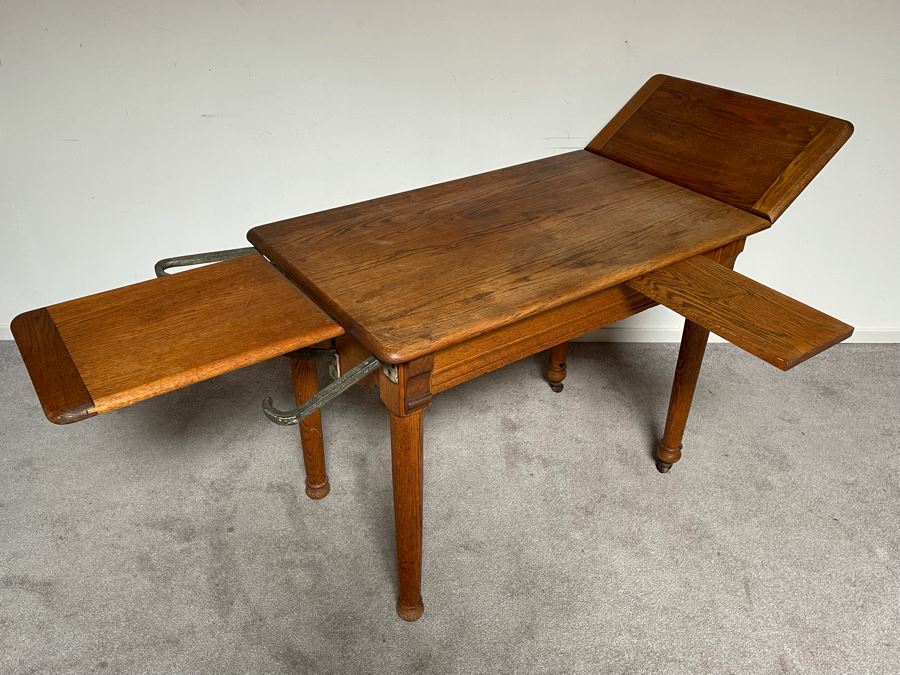 Antique Oak Doctors Medical Examiners Table Adjustable With Pair Of Metal Stirrups And Casters 41W X 24D X 29.5H [Photo 2]