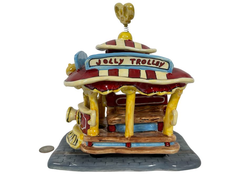 Heather Goldminc The Art Of Disney Jolly Trolley Ceramic Figurine Uses Tea Light 2 Pieces Slight Chip Underneath On One Of The Wheels - 9W X 5.5D X 9.5H See Photos Retails $80 [Photo 1]