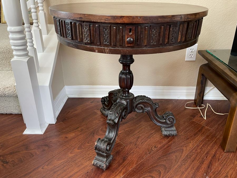 Antique Wooden Pedestal Table With Drawer (2 Of The Applied Side Decorations In Back Are Missing - See Photos) 24W X 26H [Photo 1]