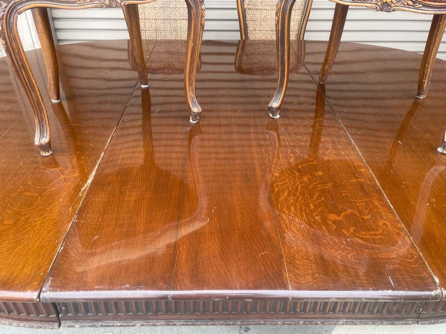 Elegant French Round Tiger Oak Dining Table With Single Leaf And Six Cane Back Chairs Table Is 66W X 94L (With Leaf) X 30H [Photo 18]