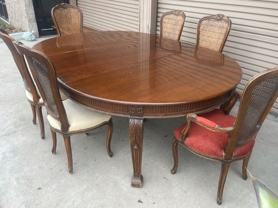 Elegant French Round Tiger Oak Dining Table With Single Leaf And Six Cane Back Chairs Table Is 66W X 94L (With Leaf) X 30H [Photo 9]
