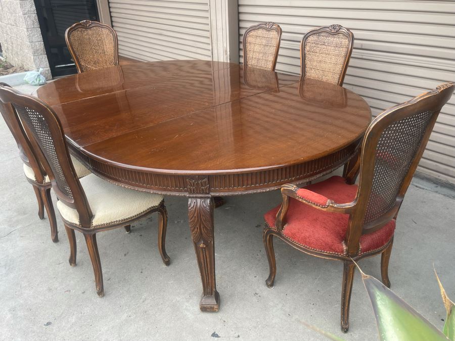 Elegant French Round Tiger Oak Dining Table With Single Leaf And Six Cane Back Chairs Table Is 66W X 94L (With Leaf) X 30H [Photo 10]