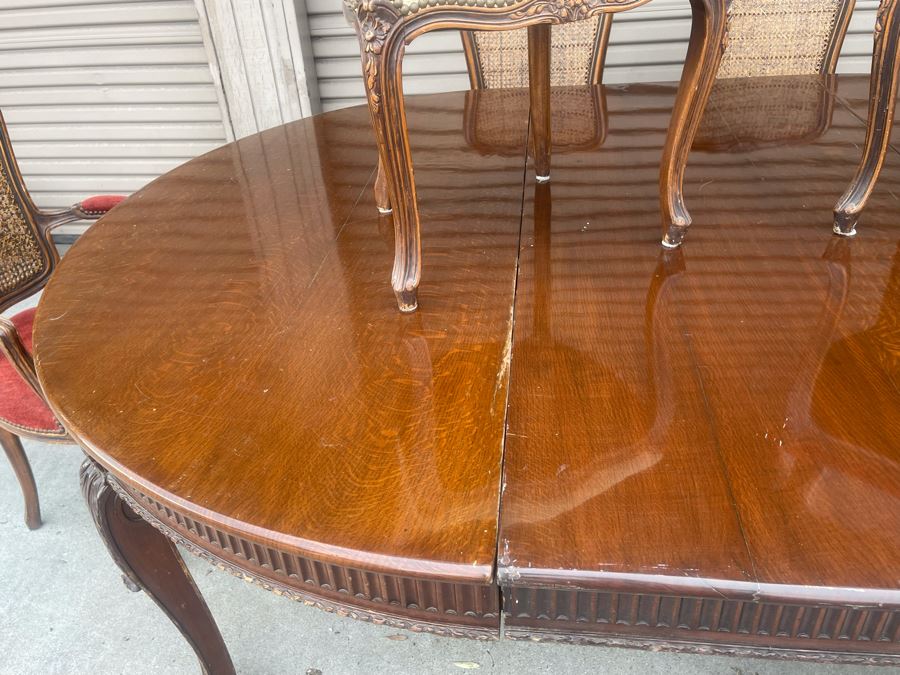 Elegant French Round Tiger Oak Dining Table With Single Leaf And Six Cane Back Chairs Table Is 66W X 94L (With Leaf) X 30H [Photo 19]