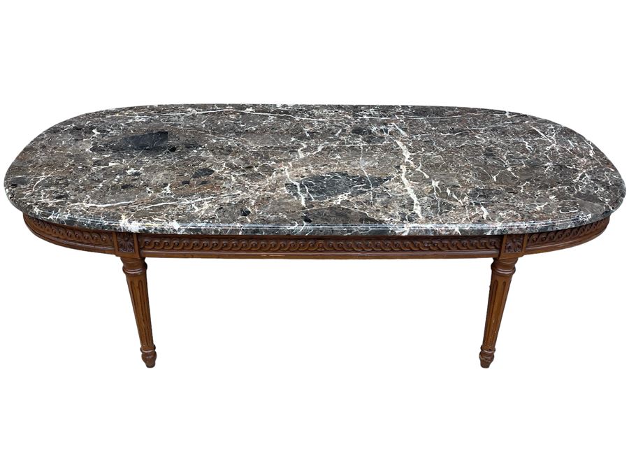 S. Pesquera Wooden Oval Base Coffee Table With Marble Top 53W X 25D X 16H [Photo 1]