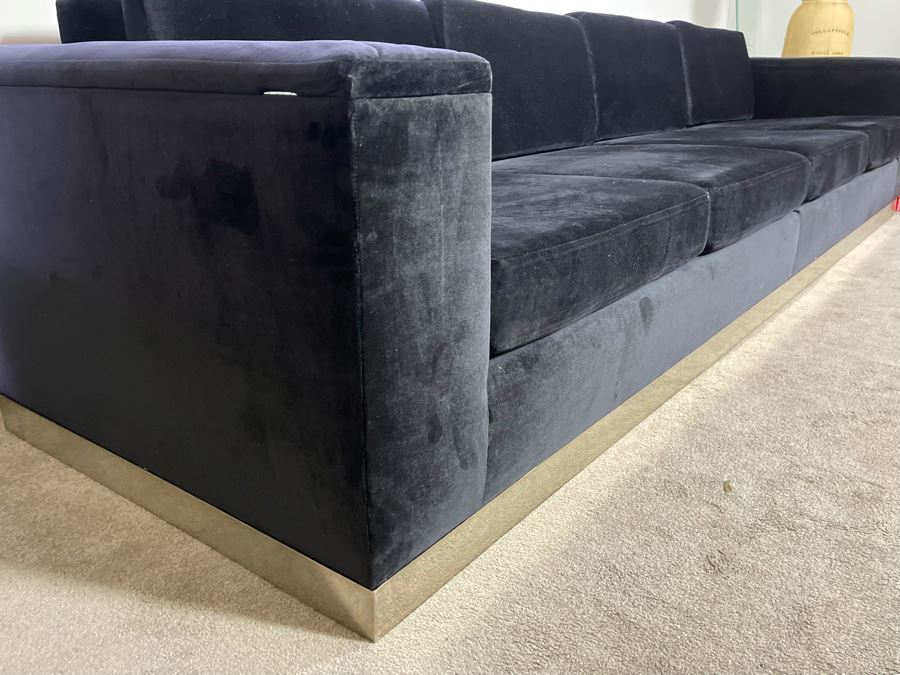 Modernist Long Sofa With Wooden Chrome Finish Base - Armrests Open Up For Storage And Electrical (Depending On The Light It's Black Or Deep Navy) 11.5'L X 38'D X 30'H (HE) [Photo 17]