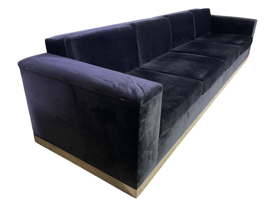 Modernist Long Sofa With Wooden Chrome Finish Base - Armrests Open Up For Storage And Electrical (Depending On The Light It's Black Or Deep Navy) 11.5'L X 38'D X 30'H (HE) [Photo 2]