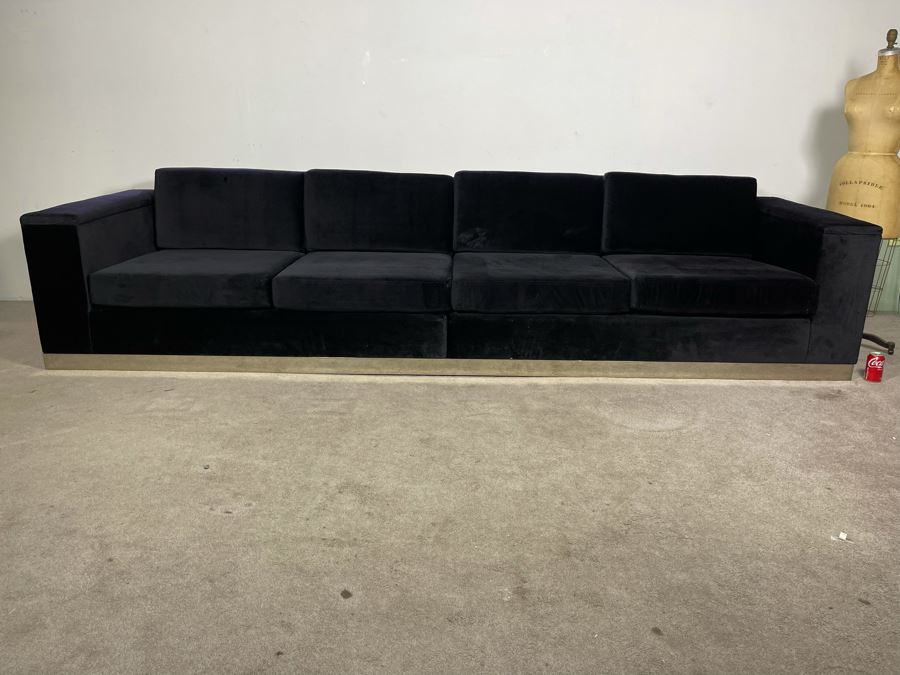 Modernist Long Sofa With Wooden Chrome Finish Base - Armrests Open Up For Storage And Electrical (Depending On The Light It's Black Or Deep Navy) 11.5'L X 38'D X 30'H (HE) [Photo 4]