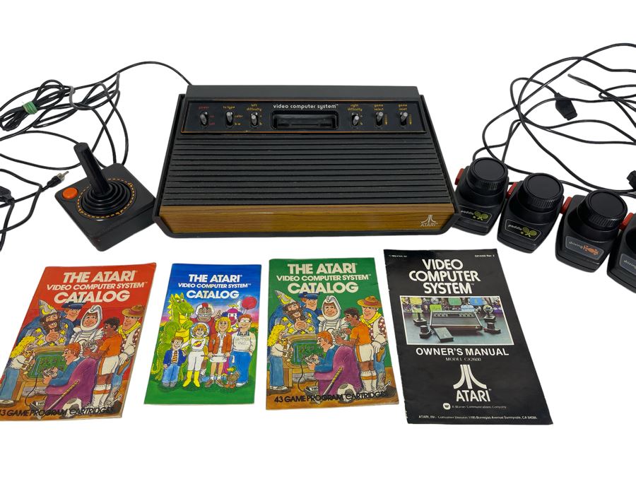Original ATARI 2600 Video Computer System Video Game System With Original Owner's Manual, Joystick, Paddle Controllers & Driving Controllers - Note Missing Power Cord [Photo 1]