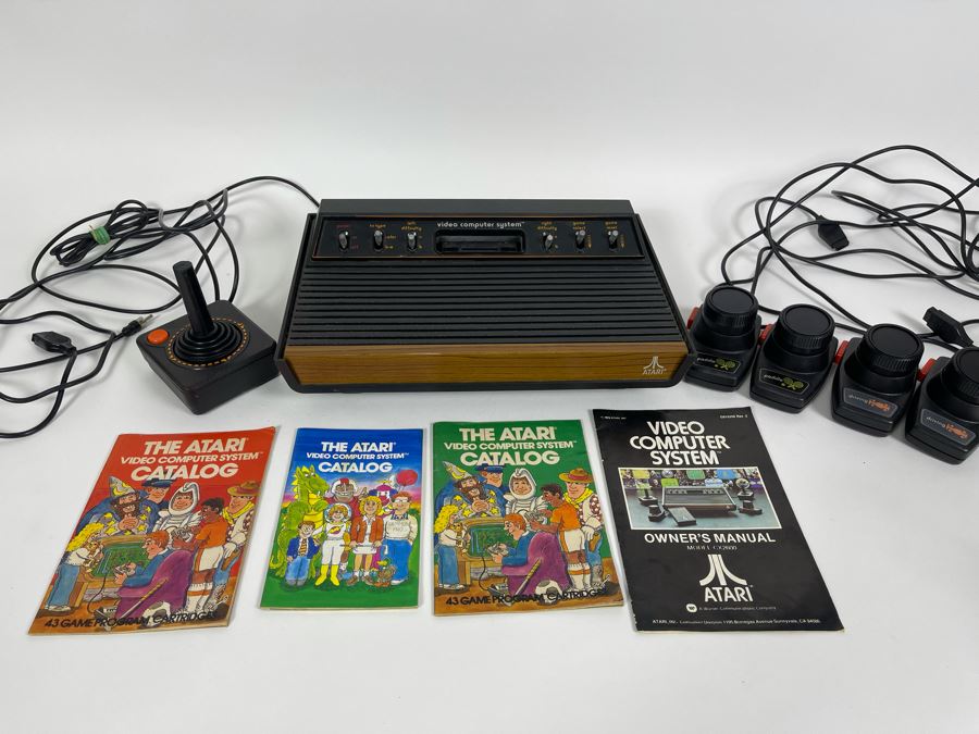 Original Atari 2600 System in Original Box + 4 Games, 2 Joysticks and  Manual.
