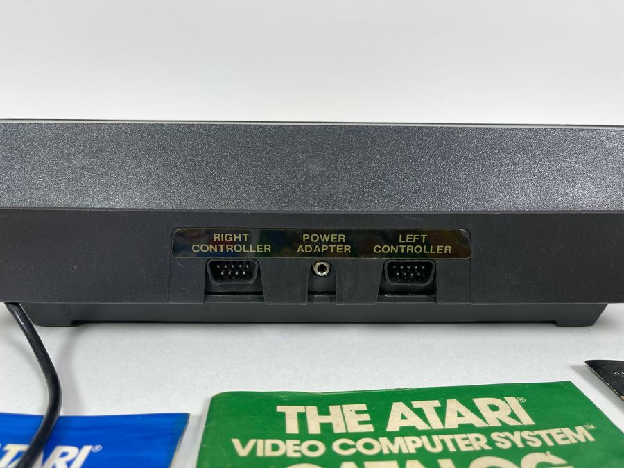 Original ATARI 2600 Video Computer System Video Game System With Original Owner's Manual, Joystick, Paddle Controllers & Driving Controllers - Note Missing Power Cord [Photo 9]