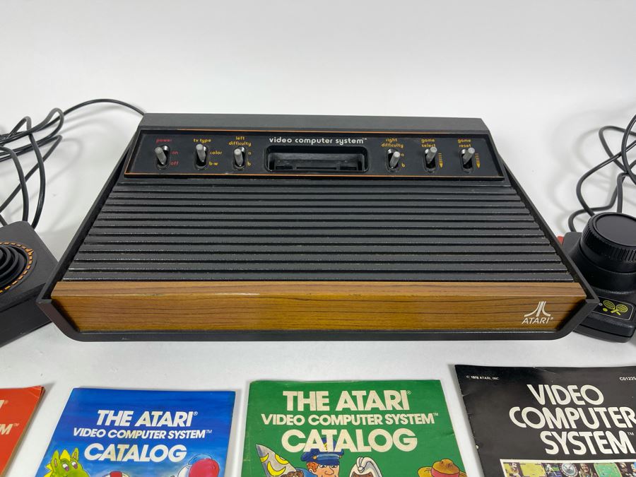 Original ATARI 2600 Video Computer System Video Game System With Original Owner's Manual, Joystick, Paddle Controllers & Driving Controllers - Note Missing Power Cord [Photo 4]