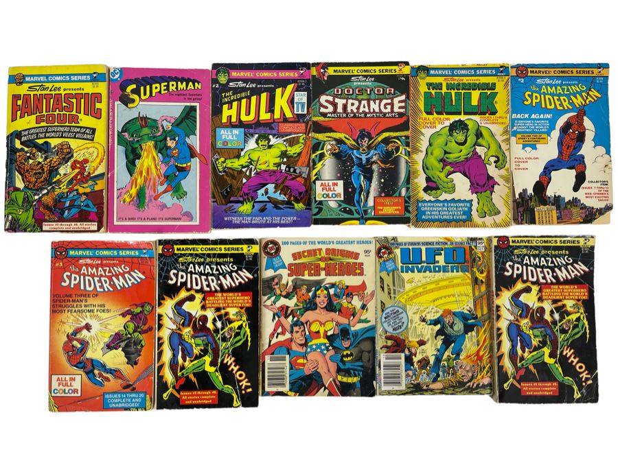 (11) Paperback Marvel / DC Comic Books Spider-Man, Hulk, Doctor Strange, Superman, Fantastic Four