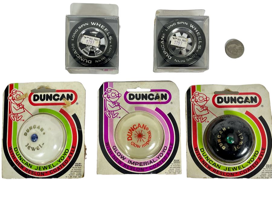 Vintage Original New Old Stock DUNCAN Yo-Yos: (2) DUNCAN Jewel, (1) DUNCAN Glow Imperial And (2) DUNCAN Long Spin Wheels