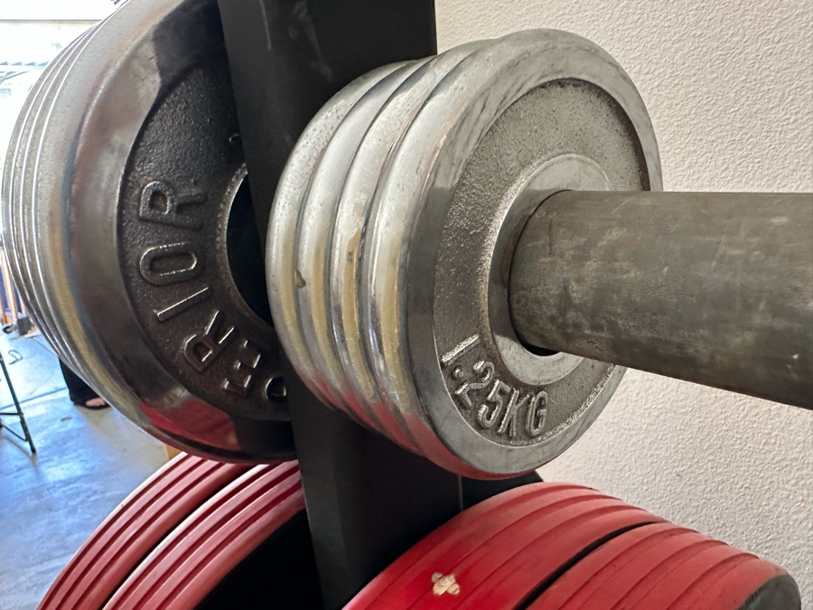 Uddeholm Sweden Competition Olympic Weights Bumper Plates With Metal Rack Plus Chrome Stand With Two 89” Long Aluminum Weight Bars And One Chrome Curling Bar [Photo 10]