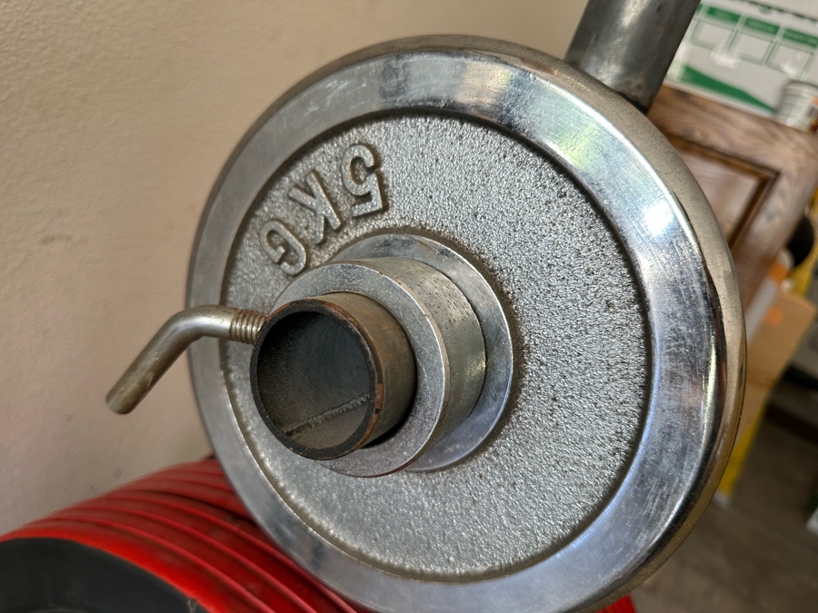 Uddeholm Sweden Competition Olympic Weights Bumper Plates With Metal Rack Plus Chrome Stand With Two 89” Long Aluminum Weight Bars And One Chrome Curling Bar [Photo 9]