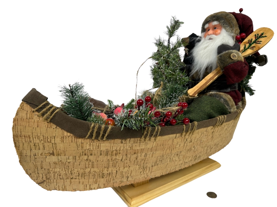 Santa Claus Riding In Canoe Christmas Decoration
