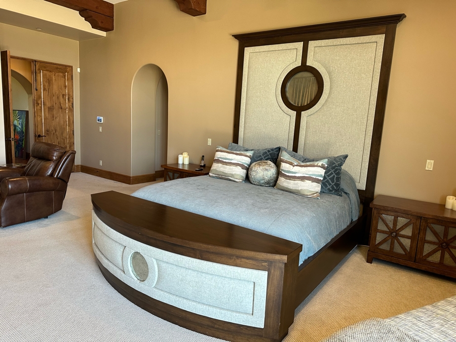 Stunning Designer Cal King Bed Featuring Tall Uphostered Headboard With Round Mirror And Upholstered Footboard With Storage Chest (Mattress / Box Spring Not Included) [Photo 4]
