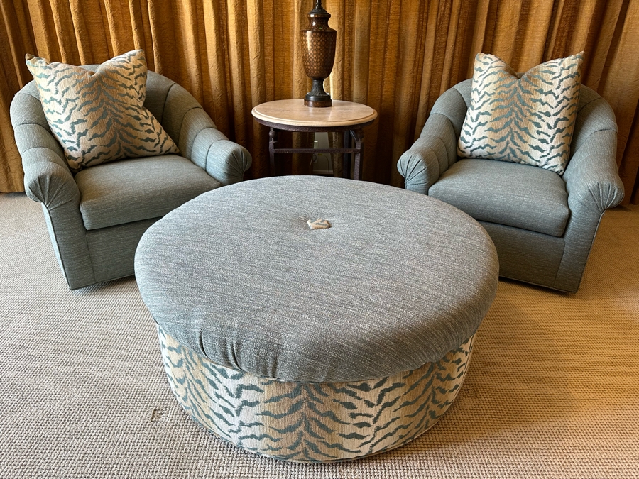 Pair Of Upholstered Armchairs With Throw Pillows 2'11'W X 3'1'D X 2'10'H And Round Upholstered Ottoman Table 3'10'R X 1'7'H [CR] [Photo 1]