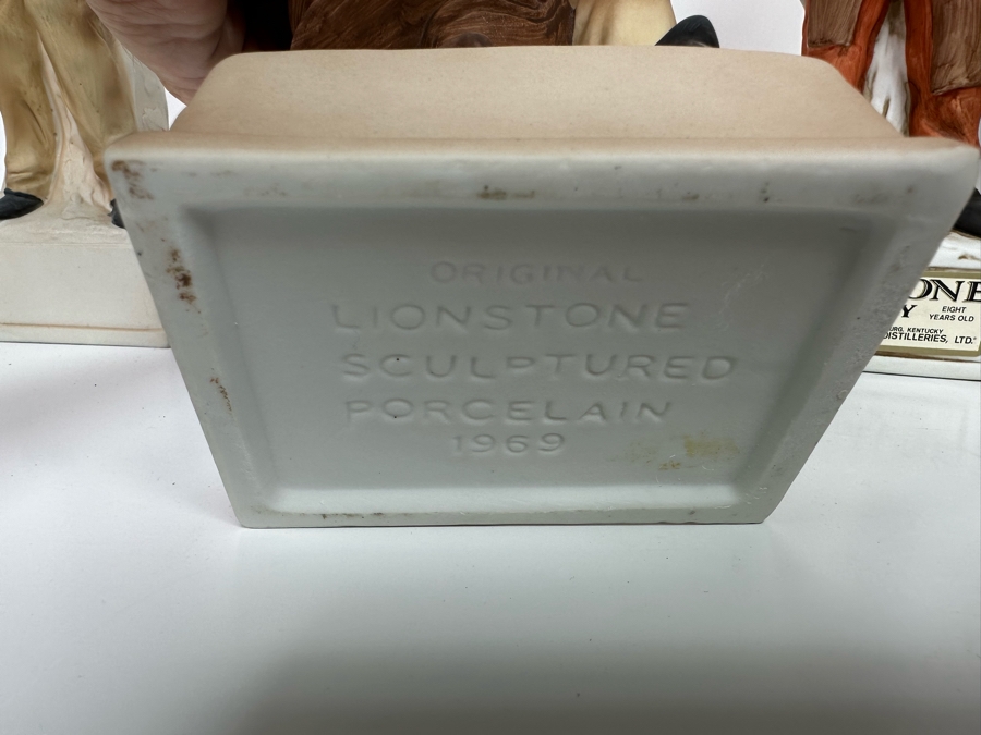 Five Porcelain Whiskey Decanters: Far Right Two Designed By C. M. Russell, Three On Left Lionstone Sculptured Porcelain 1969  Whisky 13.5H [Photo 11]