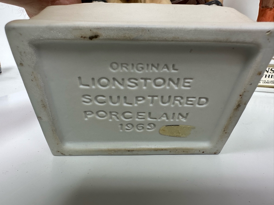 Five Porcelain Whiskey Decanters: Far Right Two Designed By C. M. Russell, Three On Left Lionstone Sculptured Porcelain 1969  Whisky 13.5H [Photo 10]