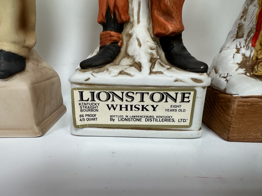 Five Porcelain Whiskey Decanters: Far Right Two Designed By C. M. Russell, Three On Left Lionstone Sculptured Porcelain 1969  Whisky 13.5H [Photo 8]