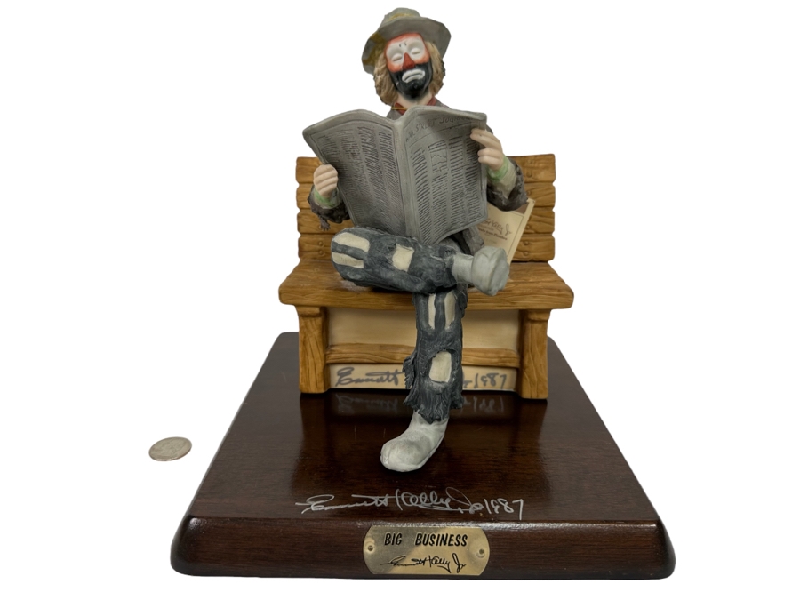 Signed Limited Edition Emmett Kelly Jr Clown Porcelain Figurine From Flambro Titled 'Big Business' Both Figurine And Wooden Base Signed By American Circus Performer Emmett Kelly Jr 9W X 9D X 9.5H [Photo 1]