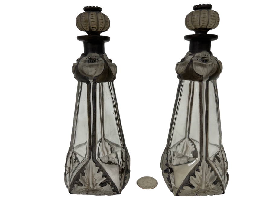 Pair Of Antique Julien Viard Scent Perfume Bottles In Clear And Frosted Glass Featuring A Raised Poppy Motif For The Fragrance 'Ghysra' By Djamila France Circa 1920 Bottom Of Glass Reads Bottle Made In Czechoslovakia 7.75H