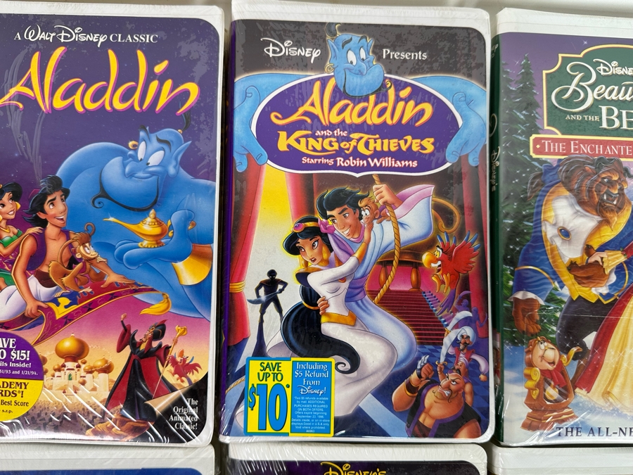Disney VHS Lot *All Sealed* Includes: Tarzan, Aladdin, Beauty and the Beast: The Enchanted Christmas, Space Jam, Mighty Ducks, 101 Dalmatians, The Jungle Book and More [Photo 13]