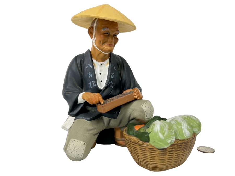 Vintage Japanese Hakata Urasaki Hand Painted Ceramic Doll Figurine Seated Man With Vegetable Basket 8W X 9H [Photo 1]