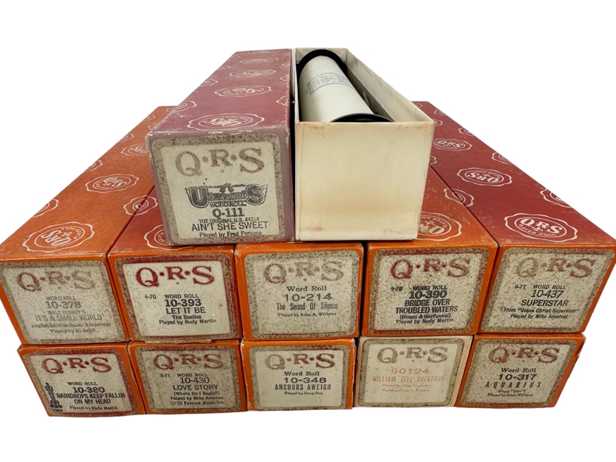 Eleven QRS Word Player Piano Rolls: Walt Disney's It's A Small World, The Beatles Let It Be, Simon & Garfunkel The Sound Of Silence And Bridge Over Troubled Waters