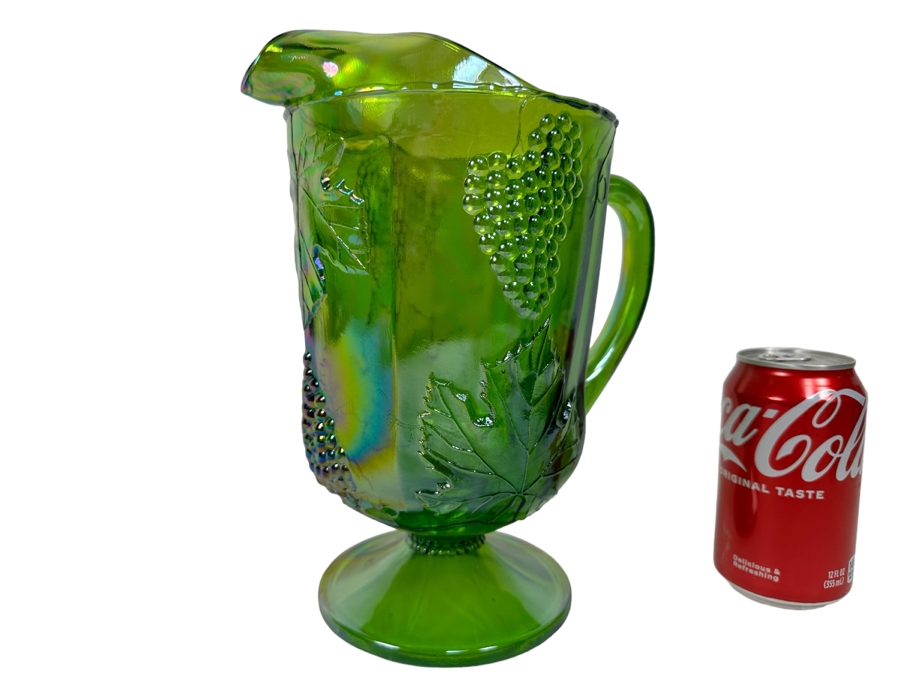Green Carnival Glass Footed Embossed Grapes & Leaves Pitcher 10H [Photo 1]