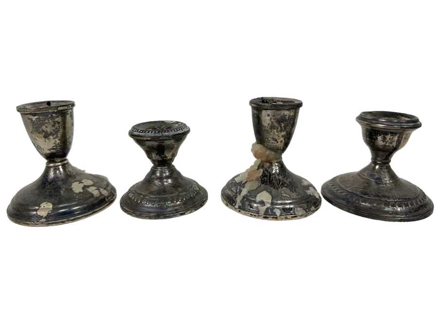 Set Of Four Weighted Sterling Silver Candle Holders